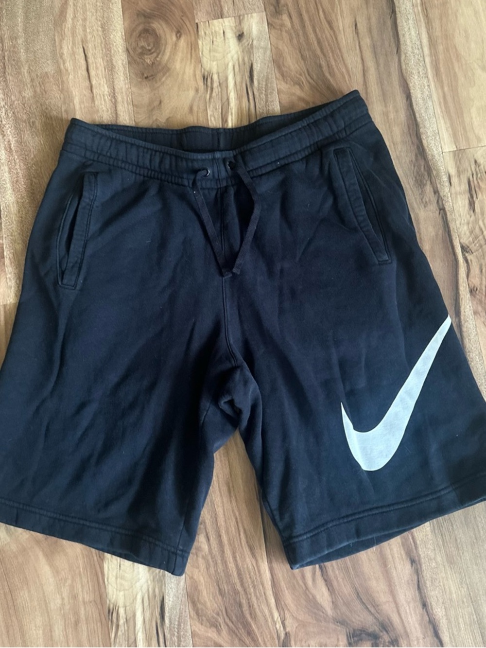 Nike Black Men's Athletic Shorts with Large White Swoosh
